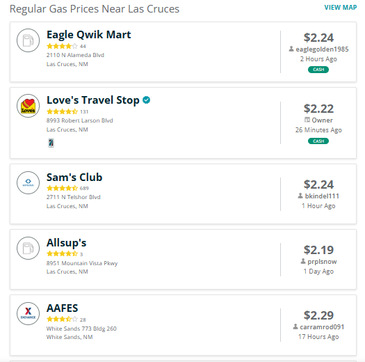 A GasBuddy results list showing regular gas prices near Las Cruces, with stations reporting prices ranging from $2.19 to $2.29 per gallon.
