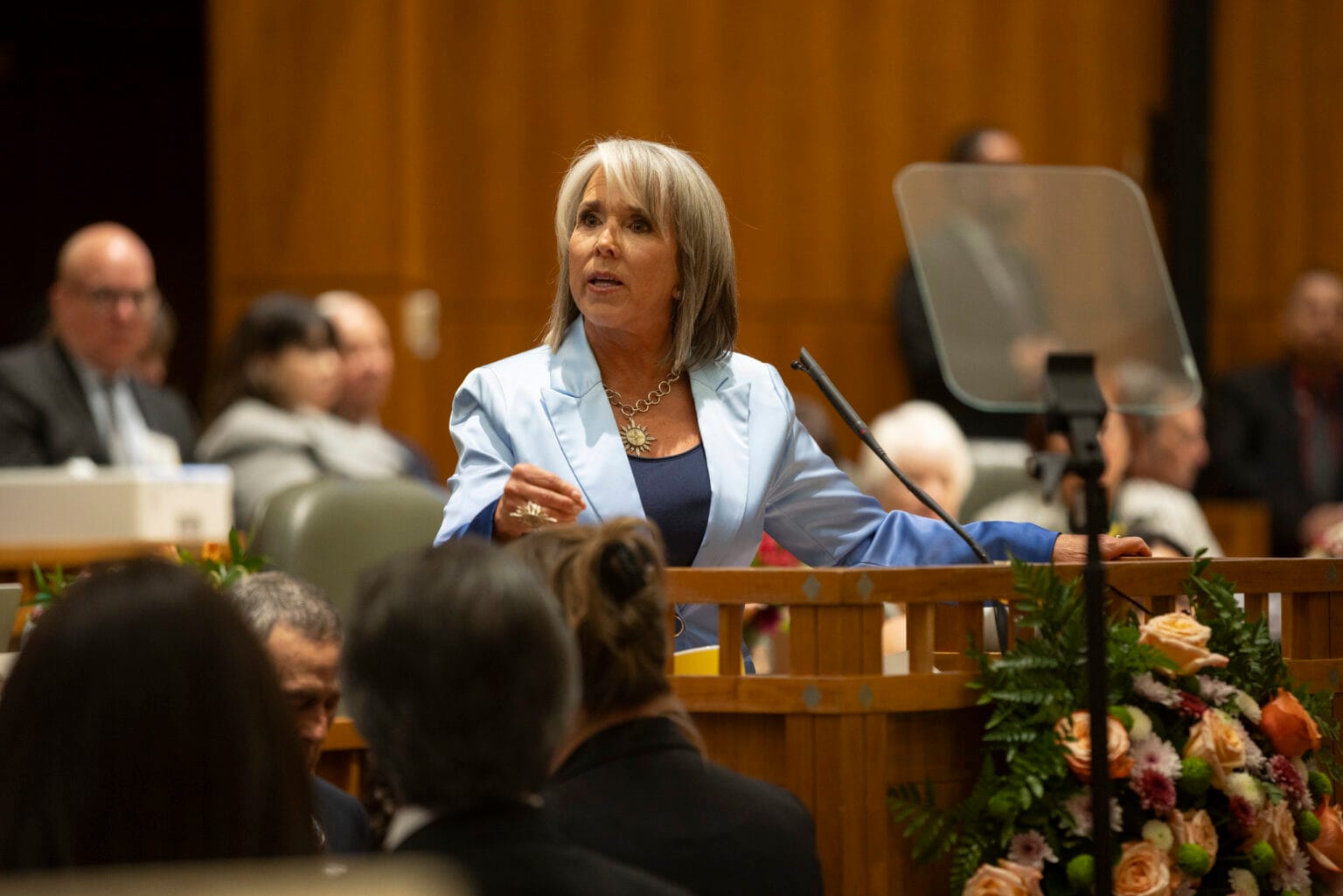 Gov. Michelle Lujan Grisham speaks from the rostrum in the New Mexico House chamber during her final State of the State address.