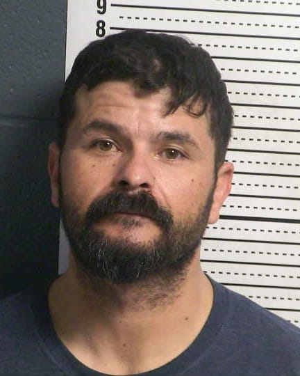 Booking photo of Joshua Melendez, who is accused of threatening a woman with a knife, assaulting her and taking her vehicle in Las Cruces