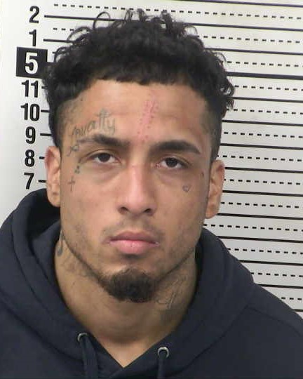 Booking photo of Angel Torres-Tovar taken at the Doña Ana County Detention Center.