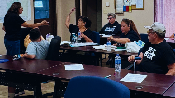 Community members participate in a Mamacítas Cibernéticas focus group in Chamberino, discussing digital literacy and internet access needs in southern Doña Ana County.