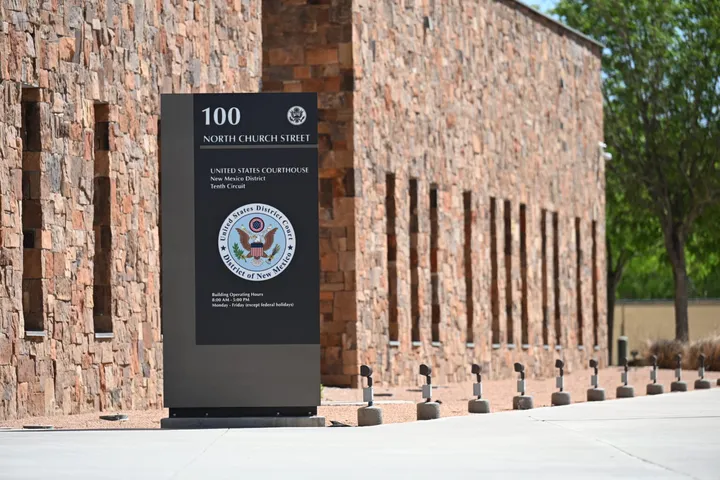 Sign outside the United States Courthouse on North Church Street in Las Cruces, New Mexico, showing the seal of the U.S. District Court for the District of New Mexico