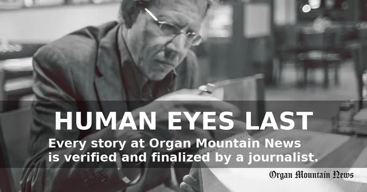 Black-and-white photo of a journalist writing in a notebook with overlay text: “Human Eyes Last” and Organ Mountain News logo.
