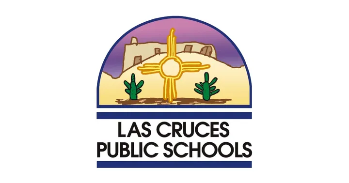 Las Cruces Public Schools logo featuring the Zia symbol in front of desert mesas and cacti, with the words “Las Cruces Public Schools” beneath the emblem.