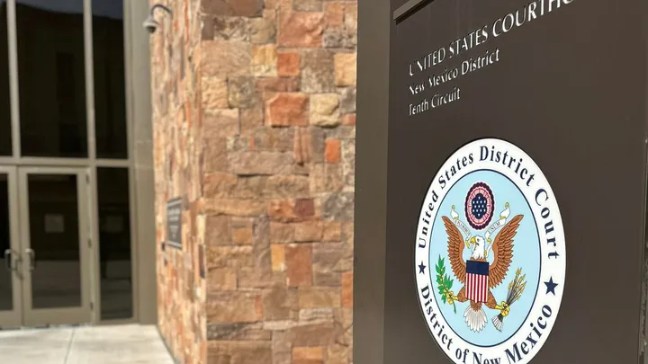 Sign outside the U.S. District Court for the District of New Mexico at the federal courthouse entrance in Las Cruces.