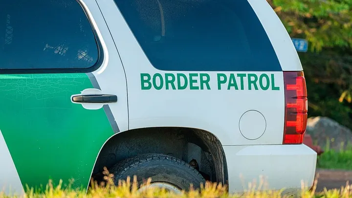 Border Patrol vehicle parked outdoors with agency lettering visible