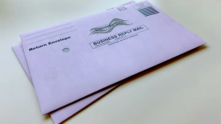 Official election mail envelopes used for absentee ballots and voter correspondence